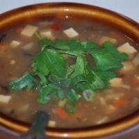 Chinese Hot & Sour Soup · Shredded bamboo shoot, black fungus mushrooms, carrot and tofu simmered in rice wine vinegar...