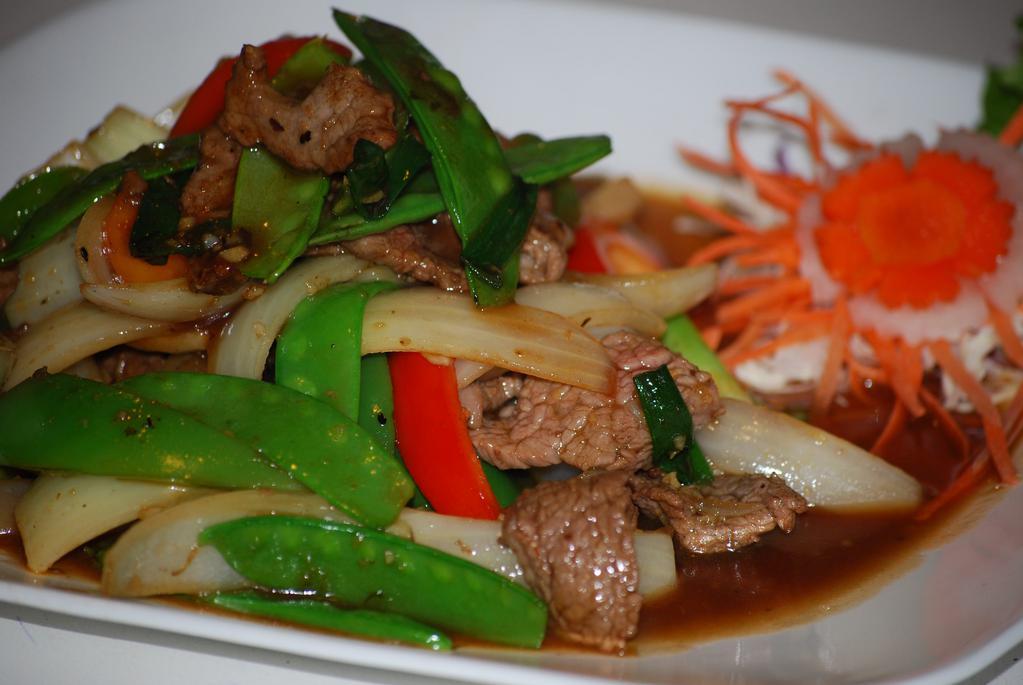 Mongolian · Your choice of protein stir fried with onions, bell peppers, mushroom and snow peas in tasty Mongolian sauce.