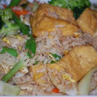 Veggie Fried Rice · White jasmine rice stir fried with eggs, fried tofu, cabbage, carrots, snow peas, broccoli, ...
