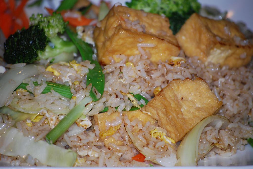 Veggie Fried Rice · White jasmine rice stir fried with eggs, fried tofu, cabbage, carrots, snow peas, broccoli, mushroom and onions. Your choice of with egg or no egg.