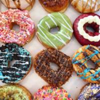 Dozen Gourmet Donuts  · Baker's choice (An assorted mix)
