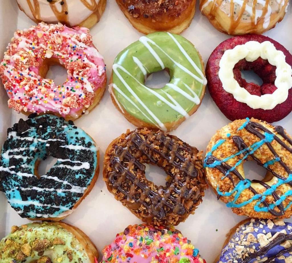 Dozen Gourmet Donuts  · Baker's choice (An assorted mix)