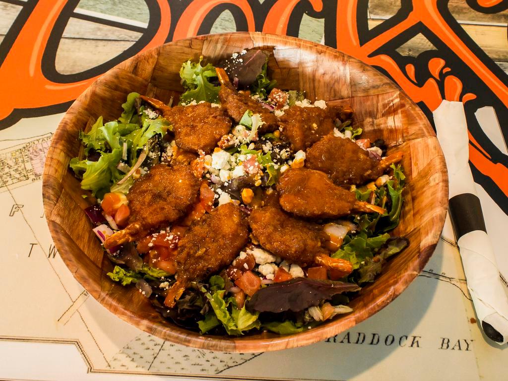 Buffalo Shrimp Salad · Crisp greens, crumbly blue cheese and fried shrimp tossed in Buffalo sauce.