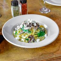 Pasta con Funghi · Fettuccine, roasted wild mushrooms, garlic, shallots, fresh herbs, spinach in a light truffl...
