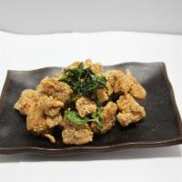 Popcorn Chicken · Served with choice of flavor.