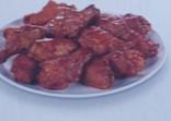 Wings · Cooked wings of a chicken coated in sauce or seasoning. Your choice of style.