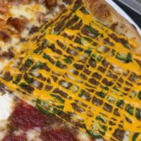 NEW Holy Nacho Pizza! · Mozzarella cheese, ground beef, jalapeños and nacho cheese sauce. 