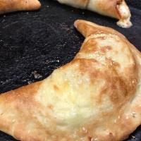Cheese Calzone · Oven baked with ricotta and mozzarella cheese.