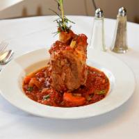 Osso Bucco Dinner · Pork shank. A meaty, and tender pork shank oven-roasted and served with our brown glaze sauce.