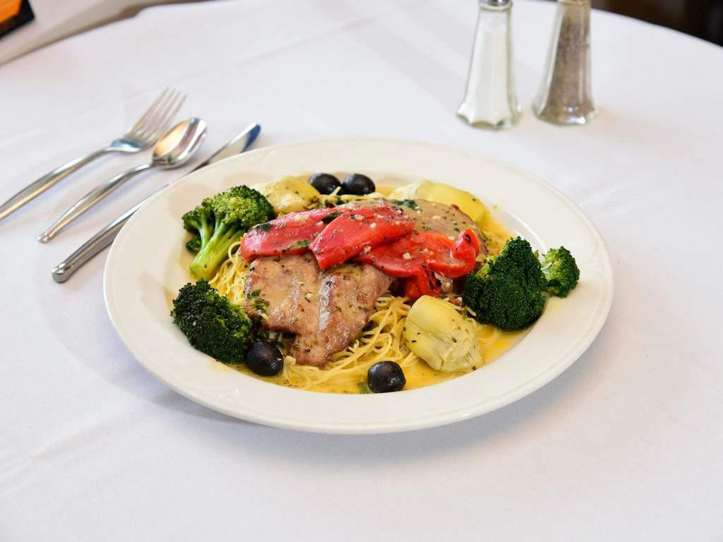 Veal Nicholas · Delicate butter wine sauce with broccoli, artichoke heart, roasted red peppers, and black olives.