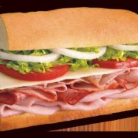 Ham and Swiss Sub · With tomatoes, lettuce, onion, vinegar, oil and oregano. Served on freshly baked bread. 