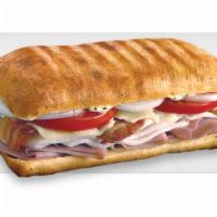The Sicilian Panini · Ham, salami, prosciuttini, and provolone served with roasted peppers and creamy Italian sauce.