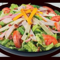 Ultimate Club Salad · Crisp lettuce blend topped with slow-cured ham, oven-roasted turkey, Swiss, American cheese,...