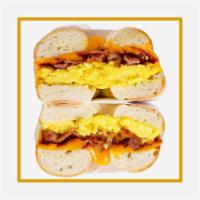  Rita's Classic Egg + Meat Breakfast Sandwich · 2 eggs + your choice of meat served on your choice of bread. Cheese & veggies optional. 
