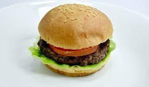 Regular Burger · Con lechuga y tomate. Comes with lettuce and tomato.