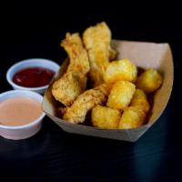 Kids Chicken Tenders · Crispy tenders and tater tots served with ketchup and velvet sauce.