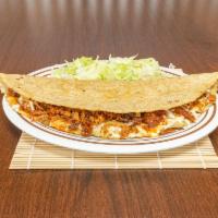 Quesadillas · 1 ft long quesadilla. Served with lettuce and 1 oz. red or green salsa on the side.