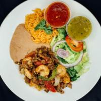 Mar y Tierra Plate · All plates served with salad, rice, beans, corn or flour tortilla and green or red chili sau...