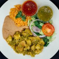 Chicharron Plate · All plates served with salad, rice, beans, corn or flour tortilla and green or red chili sau...