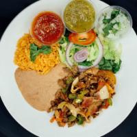 Albanil Plate · All plates served with salad, rice, beans, corn or flour tortillas and red / green chilli sa...