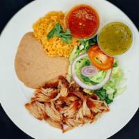 Pork Carnitas Plate · All plates served with salad, rice, beans, corn or flour tortilla and green or red chili sau...