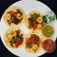 Mar y Tierra Taco Order · Served with salad. Rice, beans and red or green chilli sauce.