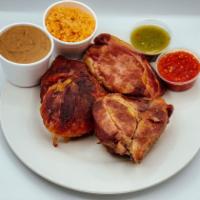 Pork Carnitas Package · Served with rice, beans, corn or flour tortilla, green / red chilli sauce.
