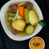 Caldo de Res / Beef Soup Bowl · Beef soup with veggies served with rice, corn or flour tortilla and green or red chili sauce.