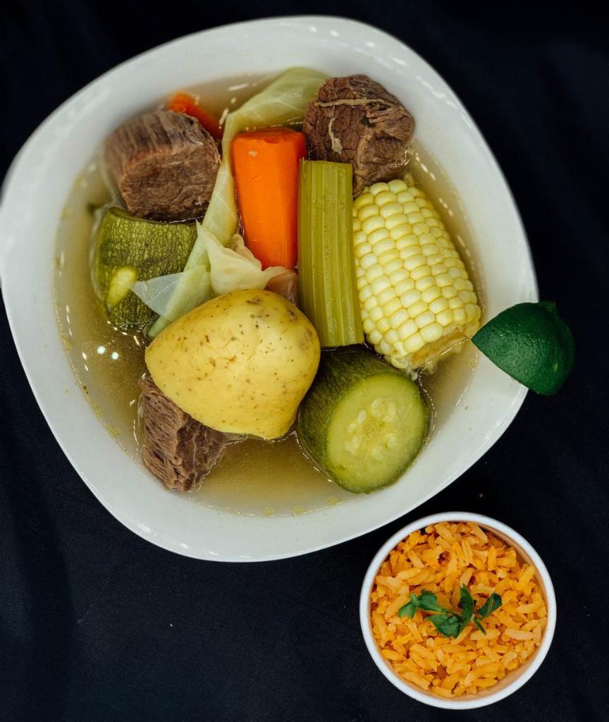 Caldo de Res / Beef Soup Bowl · Beef soup with veggies served with rice, corn or flour tortilla and green or red chili sauce.