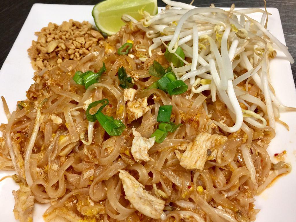 Pad Thai · Thiland's Famous stif-fry noodles with egg, bean sprouts, green onions, crushed peanuts and a wedge of lime.