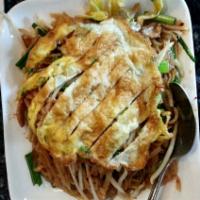 Mi-Cha · Cambodian fried noodles. Rice noodles stir-fry and topped with fried egg.