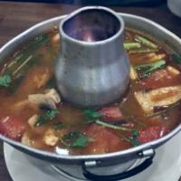 Tom Yum · Thai signature hot and sour soup. Traditional Thai sour soup with kaffir leaves, lemon grass...