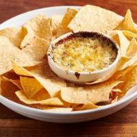 Spinach & Artichoke Dip · Served with House-Made Tortilla Chips