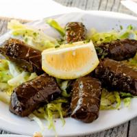 Grape Leaves · 6 rolled grape leaves drizzled with EVOO and oregano