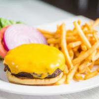 7 oz. America Cheese Burger Platter · Char-Broiled to perfection. Served with choice of either fries, rice or lemon potatoes and c...