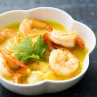 Coconut Prawn Curry · Prawns cooked in coconut powder, coconut milk, ginger, garlic, butter, carrots, onion, and s...