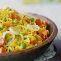Saffron Rice · Rice cooked with saffron, olive oil, onion, whole cloves, cardamom pods, black pepper, and p...