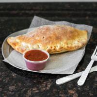Cheese Calzone · Stuffed folded pizza pocket with cheese. Add toppings for an additional charge.