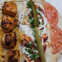 Shish Tawook Wrap with Fries · Chicken kabab.