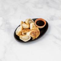 Dumplings · 8 pieces with sauce, choice of pork , vege or chicken