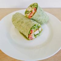 Chicken Caesar Wrap · cage-free grilled chicken, parmesan cheese, romaine lettuce, caesar dressing, and avocado