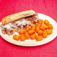 Philly Cheese Steak  · Shaved beef served on a toasted hoagie with mushrooms, grilled onions and topped with provol...