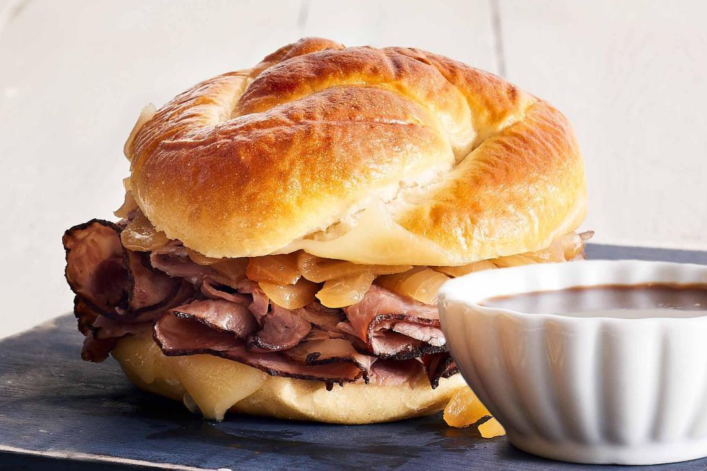 French Dip · Roast beef, 2 cheeses, caramelized onions, sourdough bun, au jus on the side.