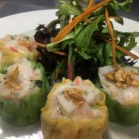 Seafood Dumpling  · Steam or Fried ,Mixed Seafood ( Shrimp, Crabmeat, Bay Scallop ) , Thai Herb wrapped with won...