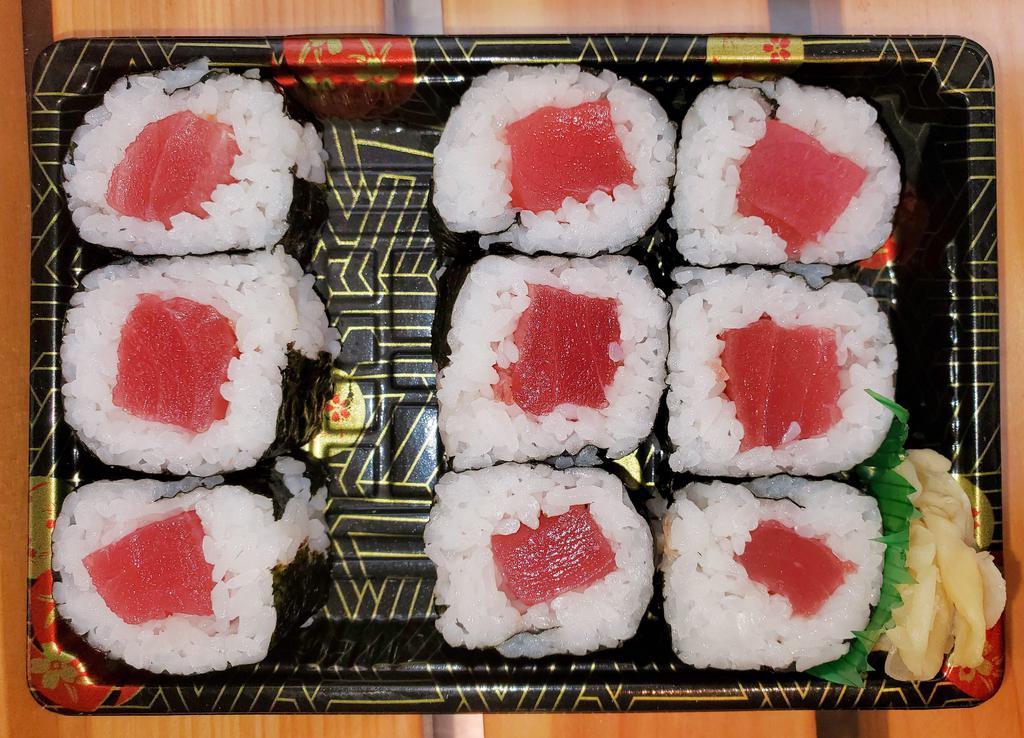 Tuna Roll · Seaweed, Rice (Vinegared), Tuna, Soy Sauce & Wasabi on the side.