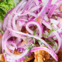 Salsa Criolla · Traditional red onion salad.