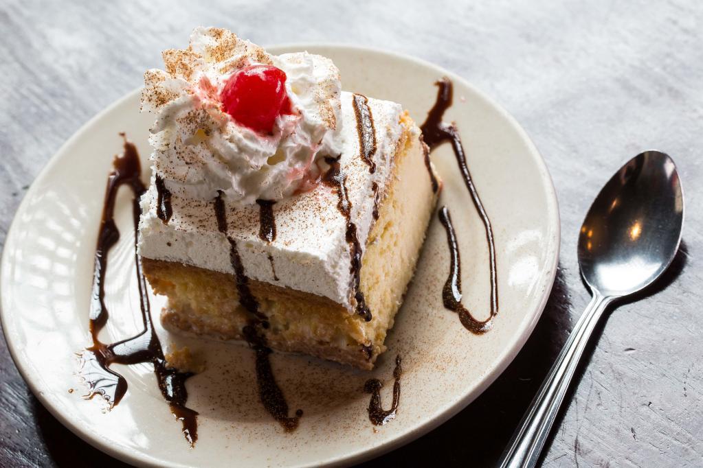 Tres Leches · Sponge cake soaked in a sweet mixture of three different milk types.