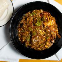 Banku and okra stew · Okra stew is made with fresh okras with three choices of crab, beef, fish, and cow feet. ste...