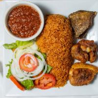 Ghanian Jollof with chicken/fish/or beef or stewed goat meat  · rice cooked with red stew to make fresh Jollof. tomatoes onions oil peppers
and seasoning