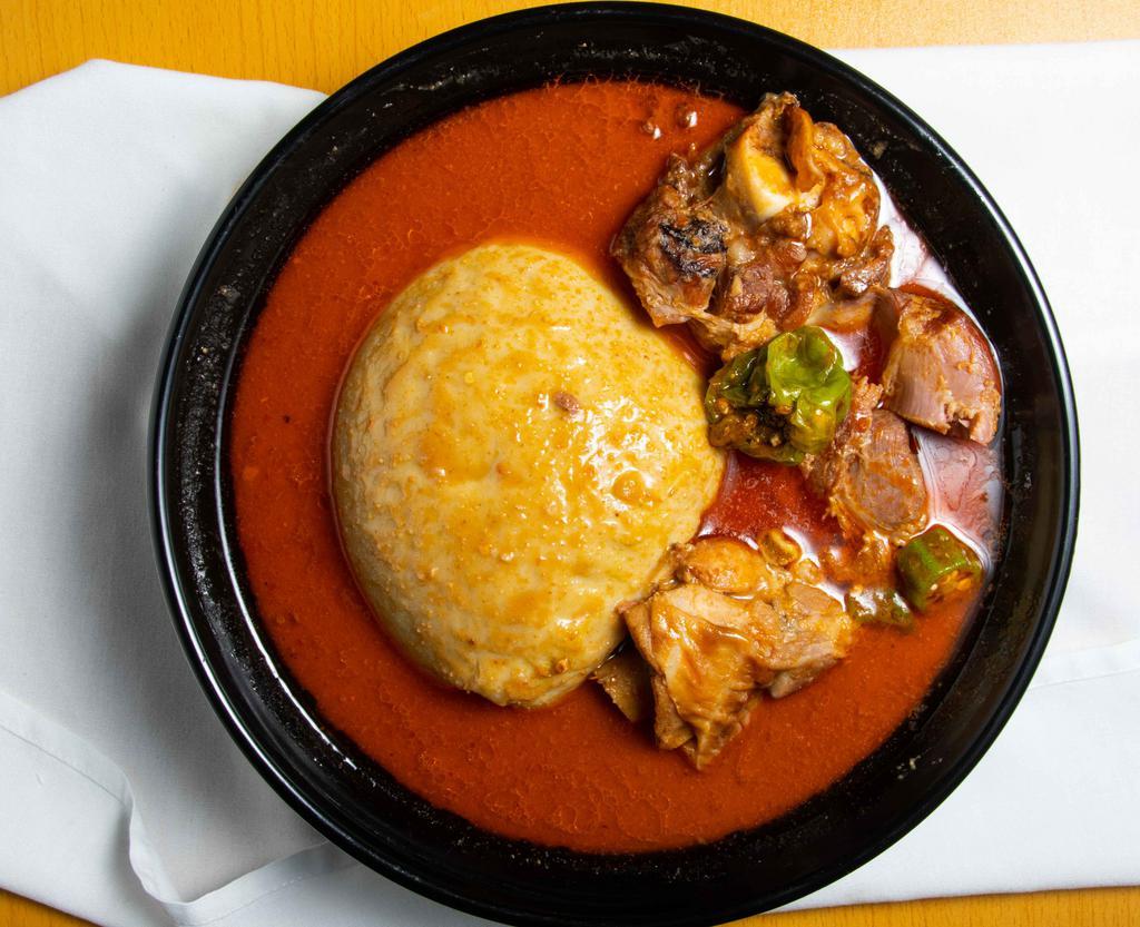 peanut butter soup and fufu · soup filled with delicious smell and aroma of peanut butter. It is served with goat meat, beef, fish or cowfeet.